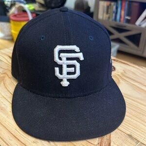 Navy Blue wool New Era fitted 7 5/8 SF Giants logo hat.